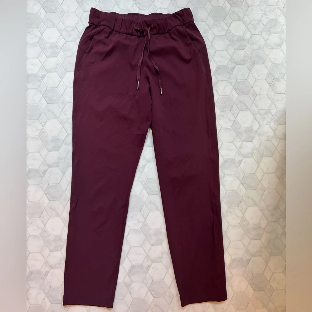 Lululemon On the Fly 7/8 Pants Dark Adobe Maroon Size 4 EUC